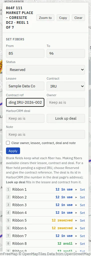 The Set fibers form: From 85, To 96, Status Reserved, Lessee Sample Data Co, Contract IRU, Contract ref “pending IRU-2026-002”, Owner blank, the HarborCRM deal box with Look up deal, Note, a box to clear owner, lessee, contract, deal and note, and Apply.