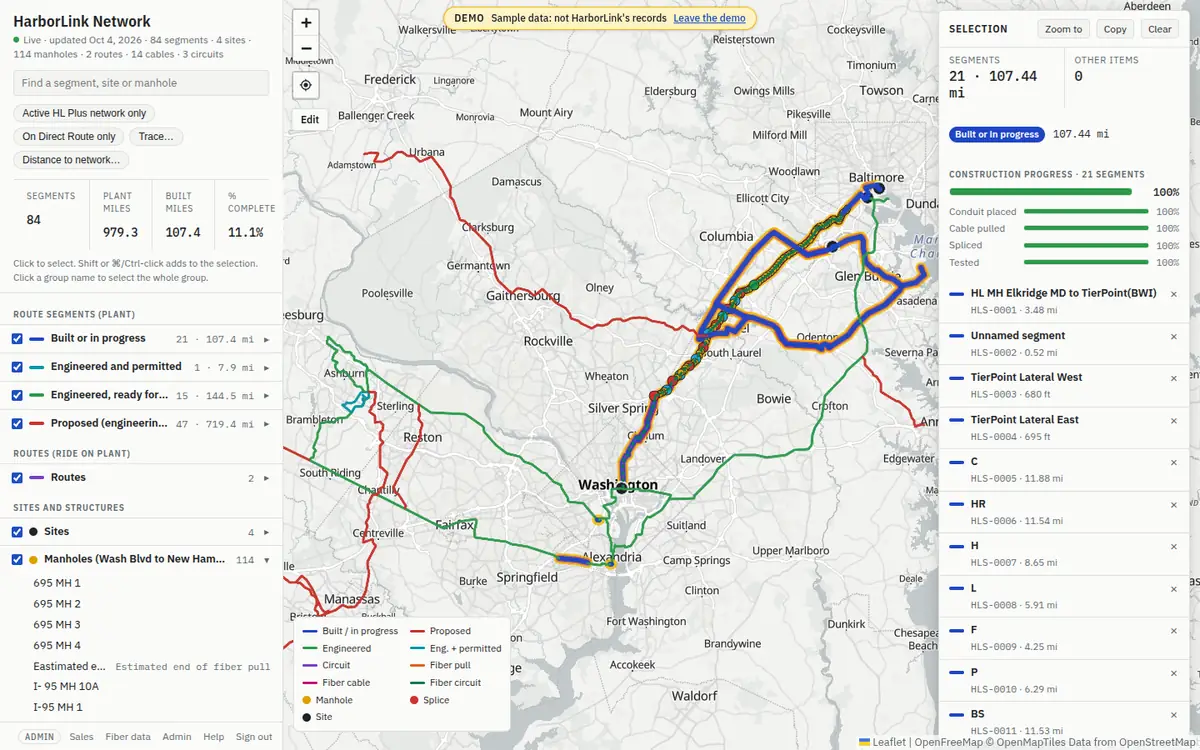 All 21 built segments selected: they glow yellow on the map, and the panel shows 21 segments, 107.4 miles, the miles per status and the combined construction progress.