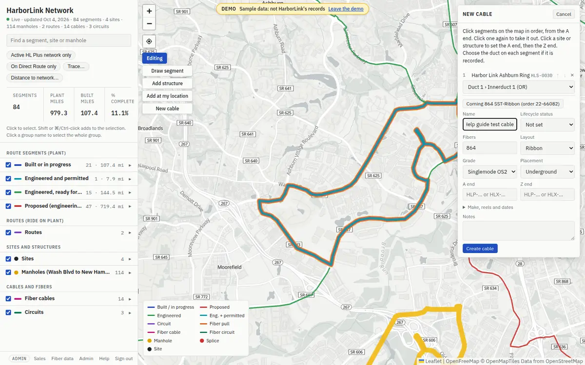 Recording a new cable: the Ashburn ring segment highlighted in pink and orange on the map, and the New cable panel with the segment, its duct, the Corning 864 button, and the fields Name, Lifecycle status, Fibers, Layout, Grade, Placement, A end and Z end.