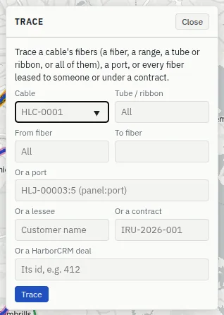 The Trace form: Cable, Tube / ribbon, From fiber, To fiber, Or a port, Or a lessee, Or a contract, Or a HarborCRM deal, and a Trace button.